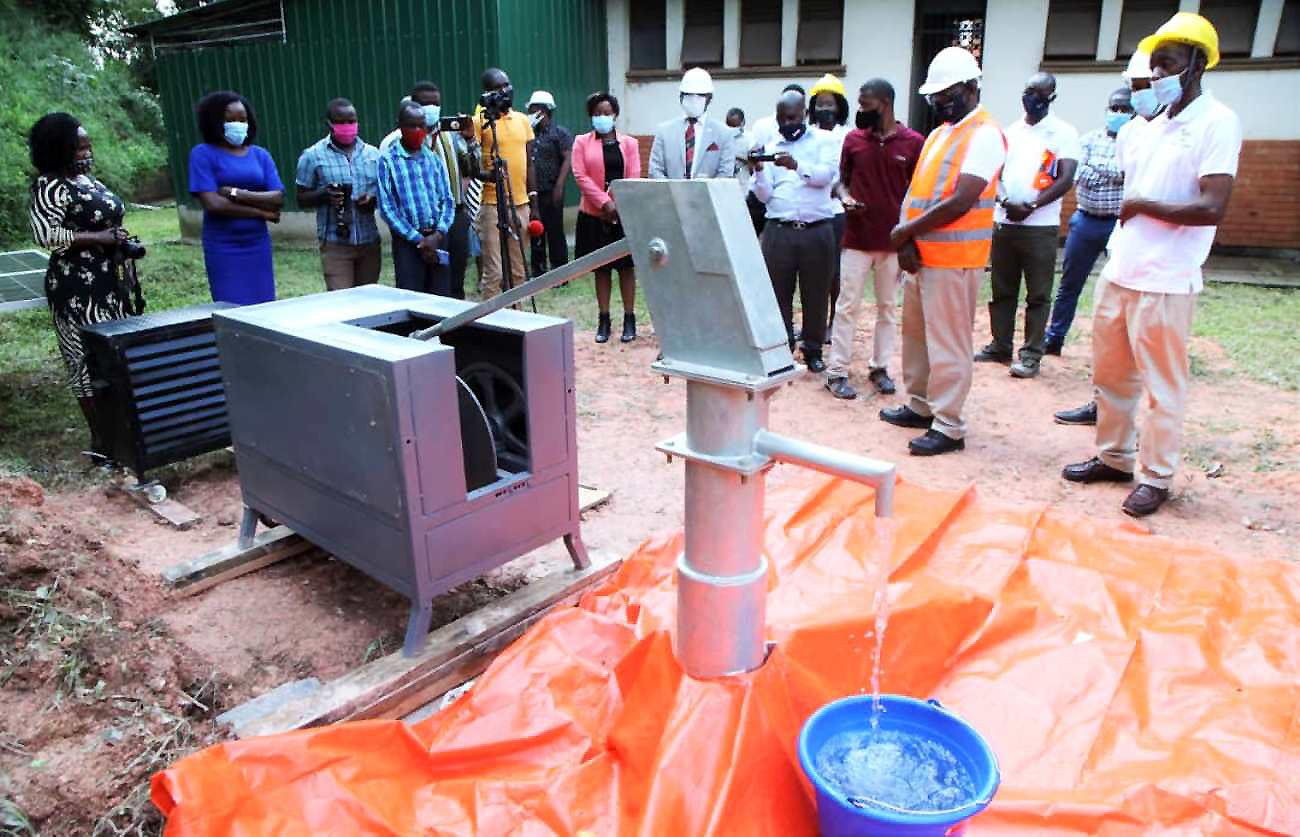 The Vice Chancellor-Prof. Barnabas Nawangwe (Grey jacket), The PI-Dr. Nicholas Kiggundu (Orange reflector jacket) and other officials witness the MAKNAI v1.0 live demo on 30th December 2020, SFTNB, Makerere University, Kampala Uganda.