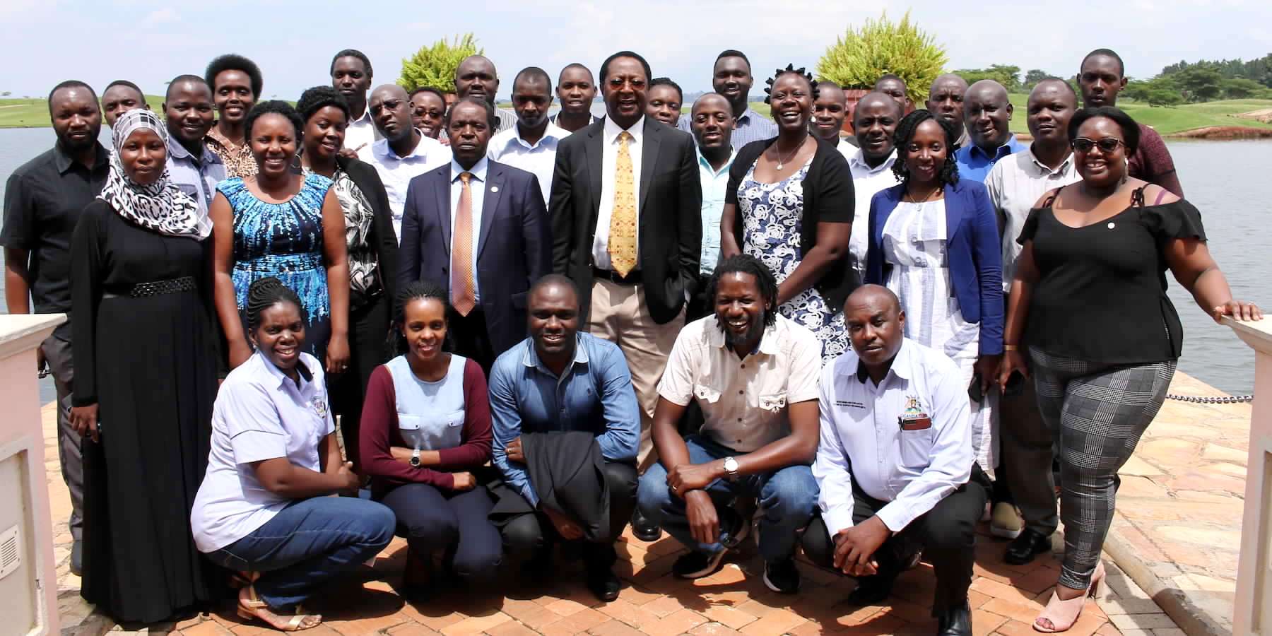 The PI-Prof. William Bazeyo (Centre Brown Tie) and Prof. David Serwadda (Centre Gold Tie) with the MakSPH-METS Program Team in 2019. Photo credit: MakSPH-METS