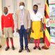 The Vice Chancellor, Prof. Barnabas Nawangwe (C) poses with P.7 pupils of Makerere University Primary School Joan Ayikoru (R) and Daniel Twesigye (L) during the visit on 18th December 2020 at the Central Teaching Facility 1 (CTF1).