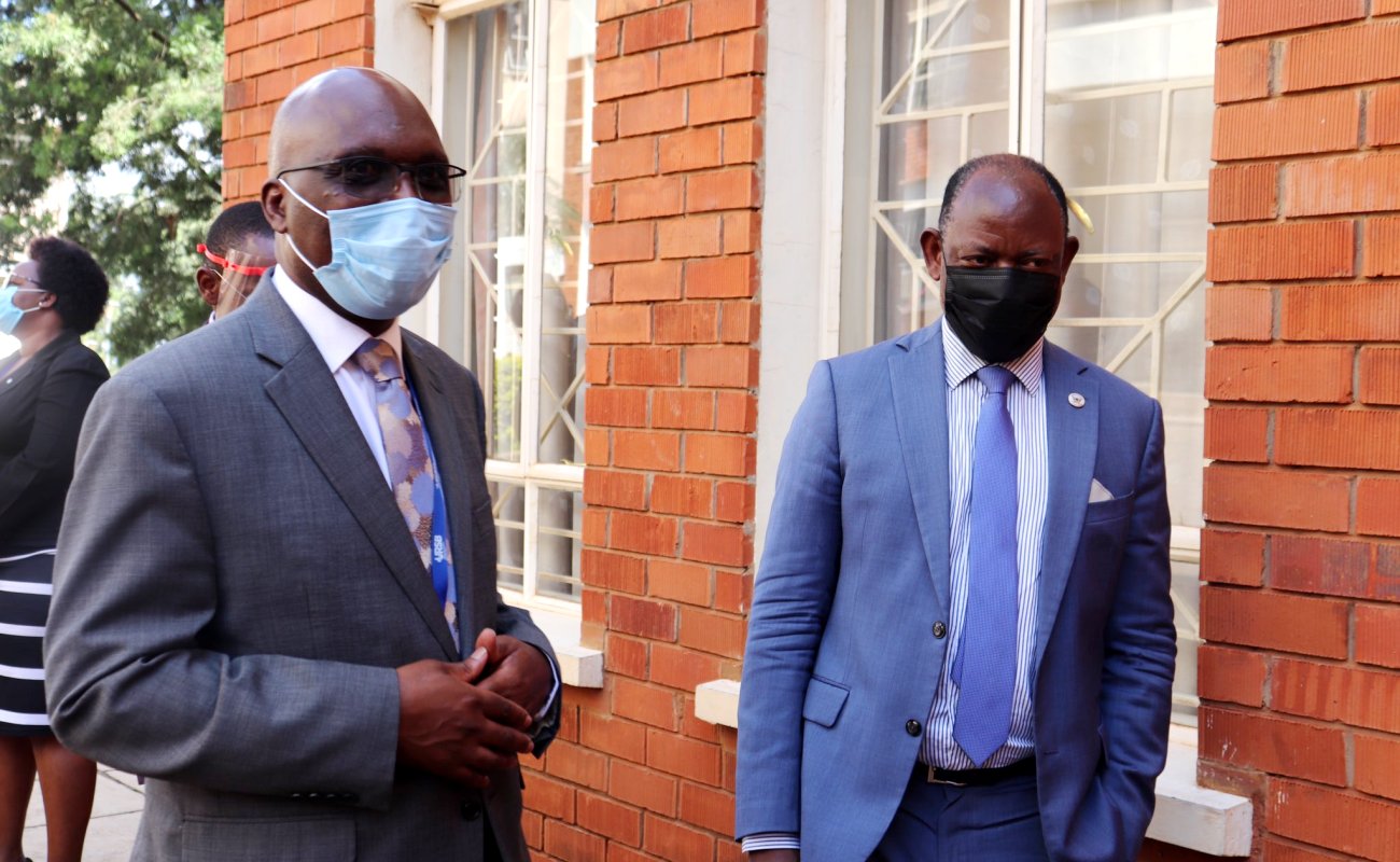 The Vice Chancellor-Prof. Barnabas Nawangwe (R) chats with the Registrar General URSB-Mr. Bemanya Twebaze (L) during the meeting on 1st December 2020, CoBAMS, Makerere University, Kampala Uganda.