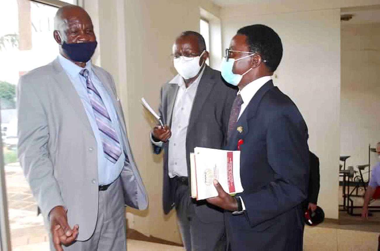 L-R: Dr. Kisamba Mugerwa, Prof. Bernard Bashaasha and Dr. Sebaggala chat during the 2nd Policy Seminar on Agro-Industrialisation and Rural Development, 15th December 2020, Conference Hall, SFTNB, CAES, Makerere University, Kampala Uganda.