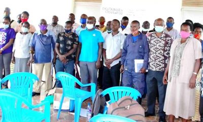 Some of the pig farmers and officials from Wakiso District pose for a group photo with researchers and students from Makerere University during the training on proper Artificial Insemination in pigs, December 2020.