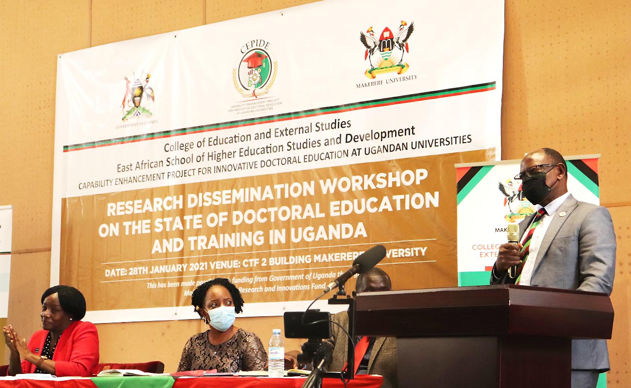 The Vice Chancellor-Prof. Barnabas Nawangwe (R) addresses participants as L-R Dr. Nora Mulira-NCHE, Dr. Sabrina Kitaka - Mak-RIF GMC and Mr. Timothy Sejjoba-MoES listen at the CEPIDE Research Dissemination, 28th January 2021, CTF2, Makerere University, Kampala Uganda.