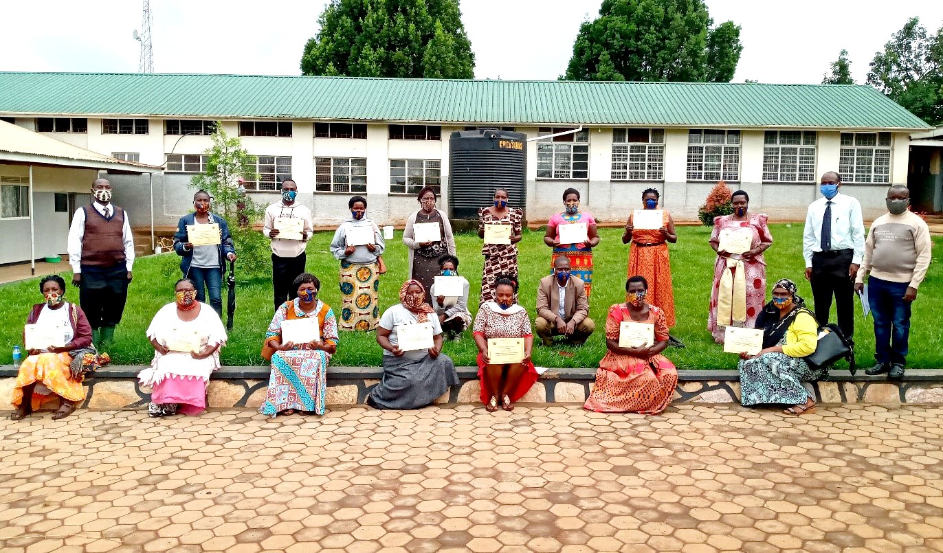 CHWs that took part in the training to enhance the capacity of communities to prevent and control NCDs organised by MakSPH in partnership with NTU, Wakiso District Local Government and MoH, with support from GCRF pose with their certificates.