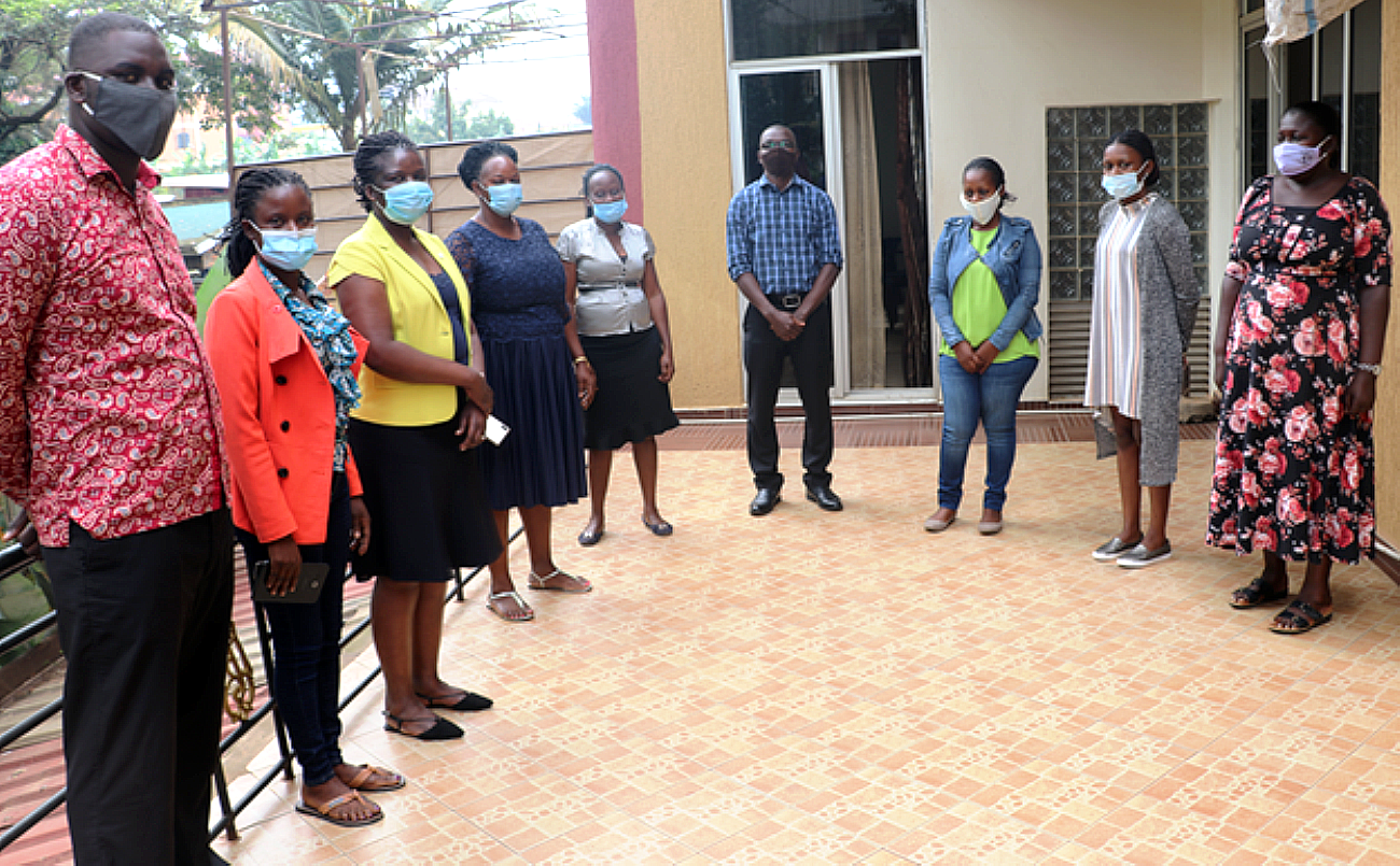 Project PI-Dr.Juliet Kiguli (3rd L), Bob Kirunda (4th R) and Sr. Nabwire Mary (R) with some members of the research team and health practitioners who will conduct research on social norms influencing type 2 diabetes risk behaviours, 4th December 2020, Grand Global Hotel, Kampala Uganda.