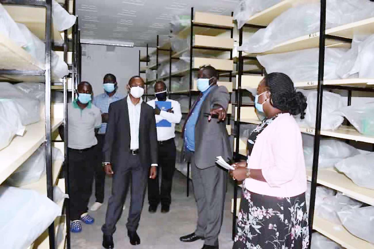 The DVCAA-Assoc. Prof. Umar Kakumba (Front L) guided by MaRCCI Director-Assoc. Prof. Richard Edema (2nd R) inspects in the cold room of the refurbished Genebank on 5th February 2021, MUARIK, CAES, Makerere University, Wakiso Uganda.