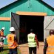 The Inspection Team prepares to make its way into the rehabilitated Agricultural Engineering Workshop Structure on 3rd February 2021, MUARIK, CAES, Makerere University, Wakiso, Uganda. Rehabilitation was undertaken with funding from the Government of Uganda through Mak-RIF.