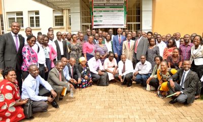 The ED National Planning Authority-Dr. Joseph Muvawala and Director DRGT-Prof. Buyinza Mukadasi (Centre) pose with some of the Postdoctoral Fellows that took part in the PhD Convention on 14th November 2019, CTF1, Makerere University.
