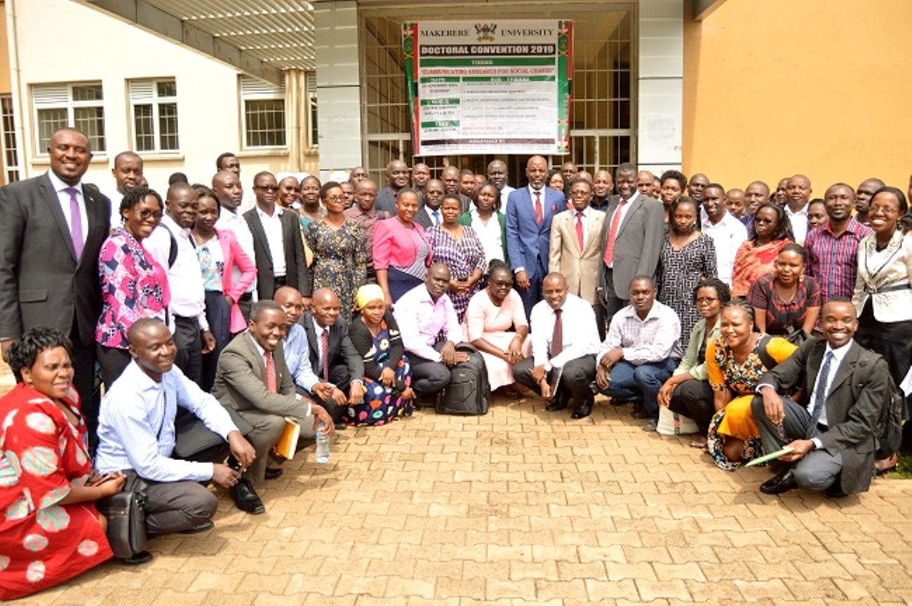 The ED National Planning Authority-Dr. Joseph Muvawala and Director DRGT-Prof. Buyinza Mukadasi (Centre) pose with some of the Postdoctoral Fellows that took part in the PhD Convention on 14th November 2019, CTF1, Makerere University.