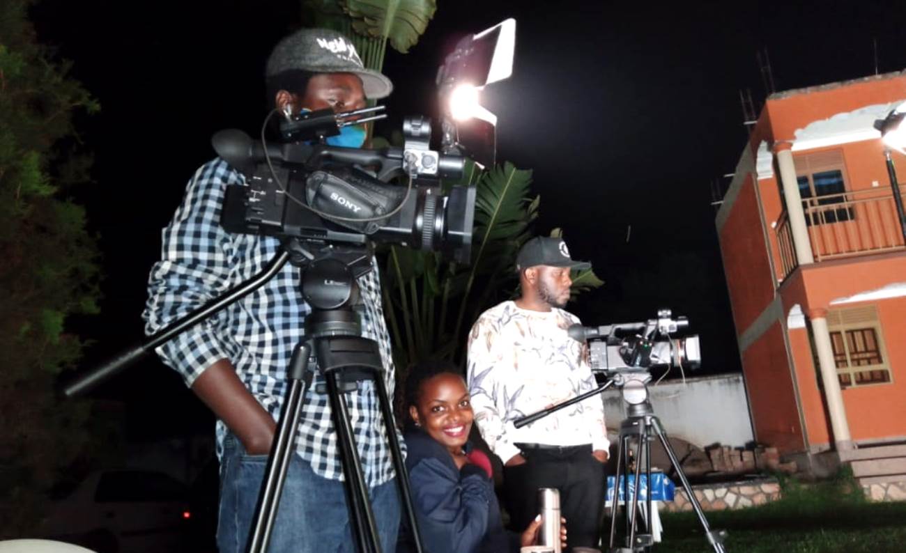 The Department of Journalism and Communication Documentary Film Crew during one of the night shoots in Luweero District, Central Uganda.