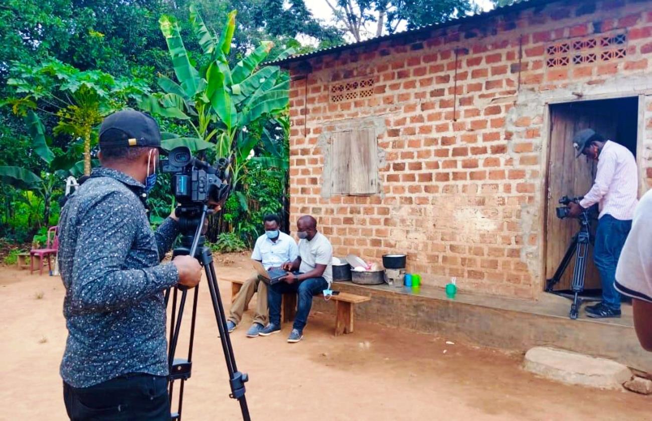 The Department of Journalism and Communication Documentary Film Crew shoots one of the scenes in a rural location in Central Uganda.
