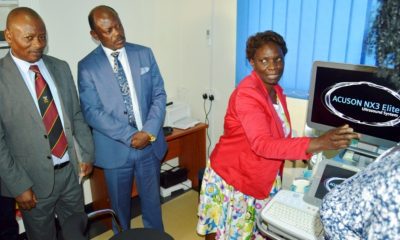 The Vice Chancellor, Prof. Barnabas Nawangwe (Centre) and Mak Hospital Director, Prof. Josaphat Byamugisha (Left) listen to Chief Radiologist Mak Health Services-Dr. Florence Musoke (Right) explain the capabilities of the state-of-the-art 3D/4D Ultrasound Unit at the Makerere University Hospital on 21st November 2019.