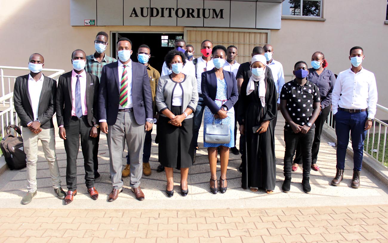 Dean of Students-Mrs. Winifred Namuwonge Kabumbuli (4th R), Head, International Office-Ms. Martha Muwanguzi (4th L), Student Guild Representative-Hon. Ahmed Abdirahman (3rd L) and International Students who attended the orientation on 18th March 2021 at CTF2, Makerere University.