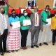 The Vice Chancellor, Prof. Barnabas Nawangwe (L) with MCFSP Coordinator-Dr. Justine Namaalwa (R), MCFSP Selection Committee Chairperson-Dr. Muhammad Ntale (3rd R) and some of the recipients during the Scholarship Award ceremony on 12th March 2021, CTF2 Auditorium, Makerere University.