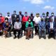 Seated: The Chairperson Council-Mrs. Lorna Magara (3rd R) and Vice Chancellor-Prof. Barnabas Nawangwe (3rd L) with R-L: Dr. Vincent Ssembatya, DVCAA-Dr. Umar Kakumba, Prof. Rhoda Wanyenze and Dr. Josephine Ahikire and other Members of Management (standing) after the Self-Assessment meeting on 12th March 2021, Kampala Skyz Hotel.