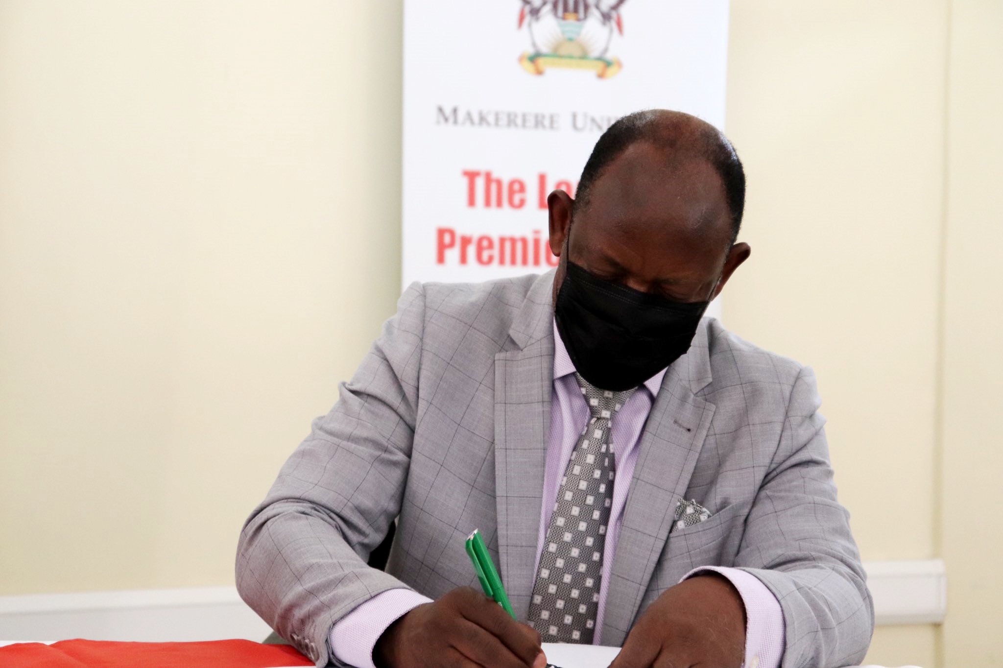 The Vice Chancellor, Prof. Barnabas Nawangwe signs the MoU on behalf of Makerere University with Alfasan (U) Ltd. on 19th March 2021 at CoVAB.