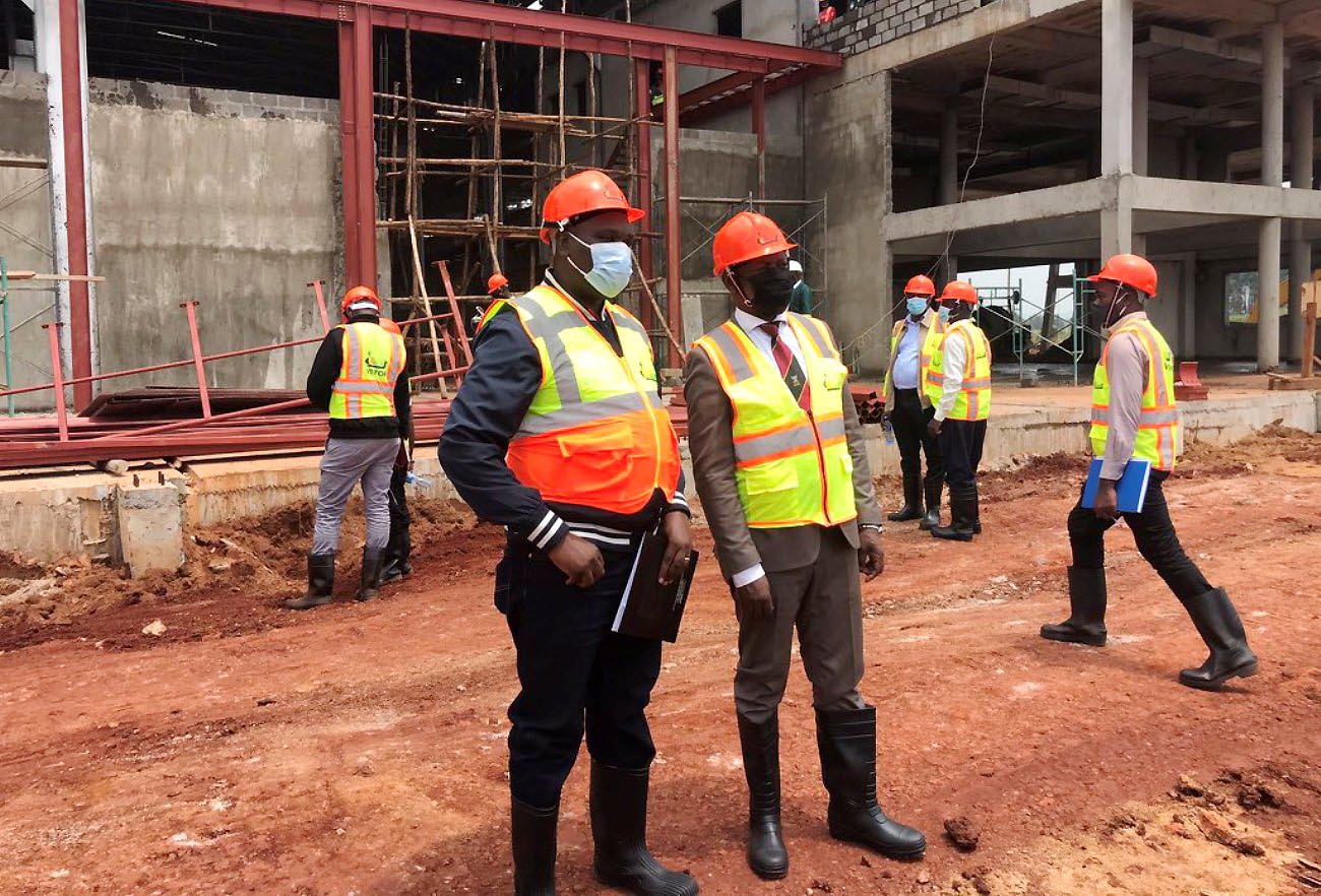 The Vice Chancellor, Prof. Barnabas Nawangwe (2nd L) and KMC CEO, Mr. Paul Isaac Musasizi (L) during a tour of the Corporation Plant in Jinja on 18th February 2021.