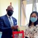 The Vice Chancellor, Prof. Barnabas Nawangwe (L) receives an assortment of Chinese New Year Gifts from Confucius Institute Director, Mrs. Xia Zhuoqiong on 9th February 2021, CTF1, Makerere University.