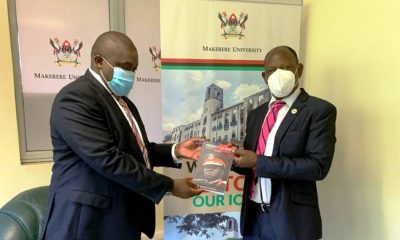 The Vice Chancellor, Prof. Barnabas Nawangwe (R) receives a book on Idi Amin by William Muwonge on 24th March 2021, CTF1, Makerere University.