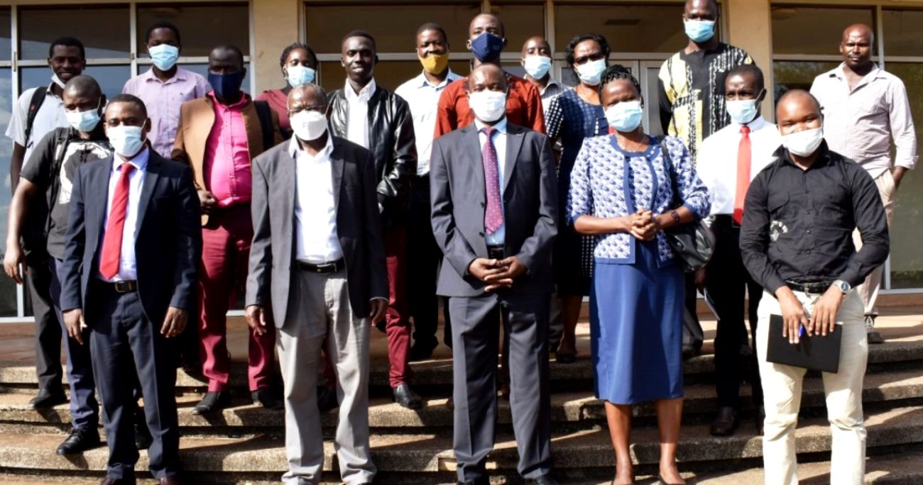 The Main Speaker-Dr. Henry Nakelet Opolot (C) with the Principal CAES-Prof. Bernard Bashaasha (2nd L), PI-Dr. Rosemary Isoto (2nd R) and other guests after the event on 20th April 2021, Food Science Conference Hall, Makerere University.