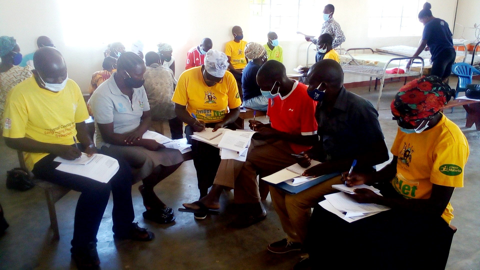 Village Health Teams from Adropi sub-County take part in the training organised by IDI with funding from CDC at Openzinzi HCIII, April 2021.