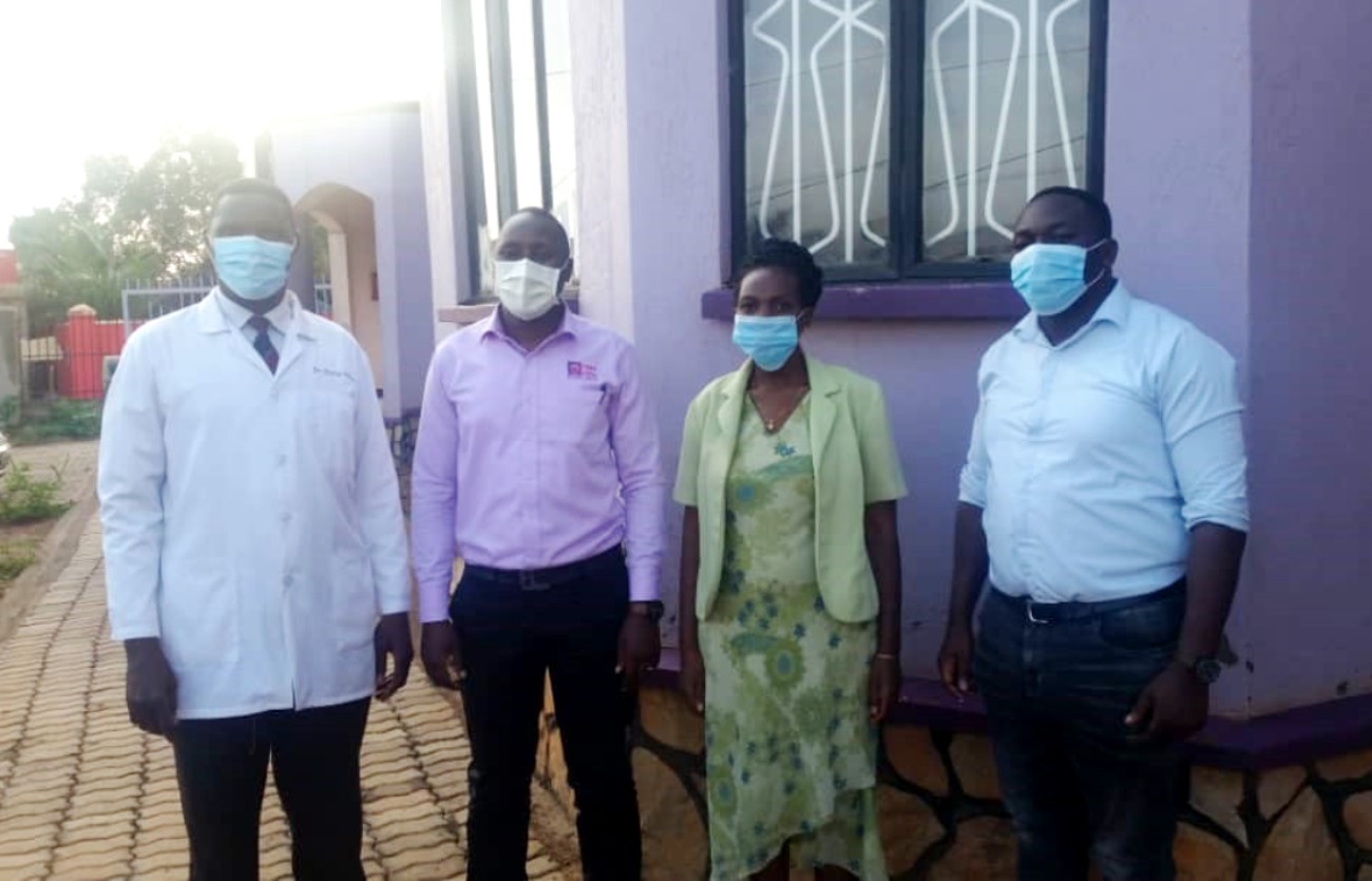 Project Principal Investigator, MakSPH's Dr. Harriet Babikako (2nd R), the Department of Pediatrics and Child Health's Dr. Ezekiel Musasizi (1st R) and Dr. Ezekiel Mupere (1st L) and Mr. Haron Gichuhi (2nd L) after the application launch at Child and Family Foundation Uganda Offices, Kampala.