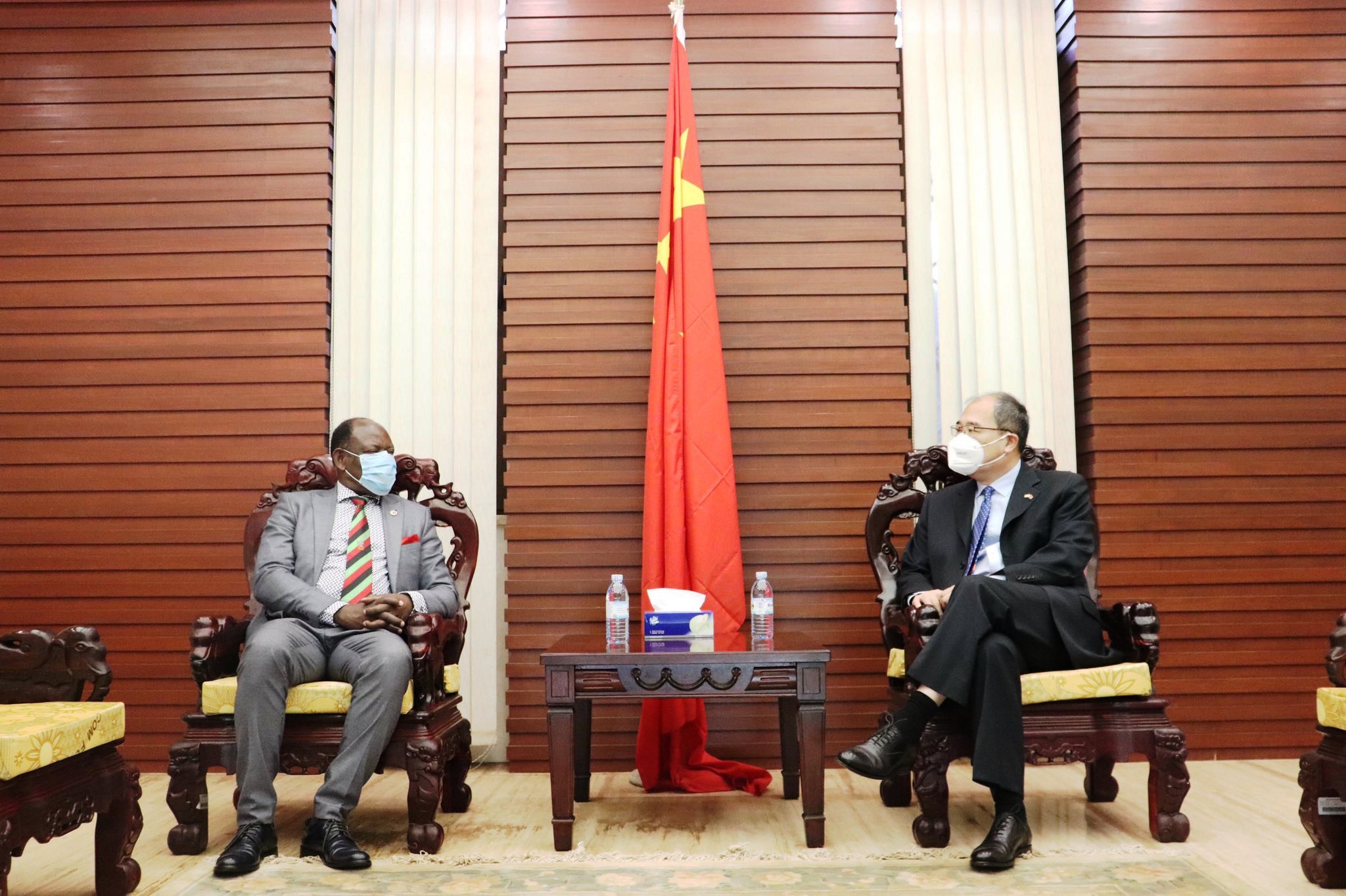 The Vice Chancellor, Prof. Barnabas Nawangwe (L) chats with his host H.E. Zheng Zhuqiang (R) during his visit to the Embassy of the People's Republic of China on 7th April 2021.