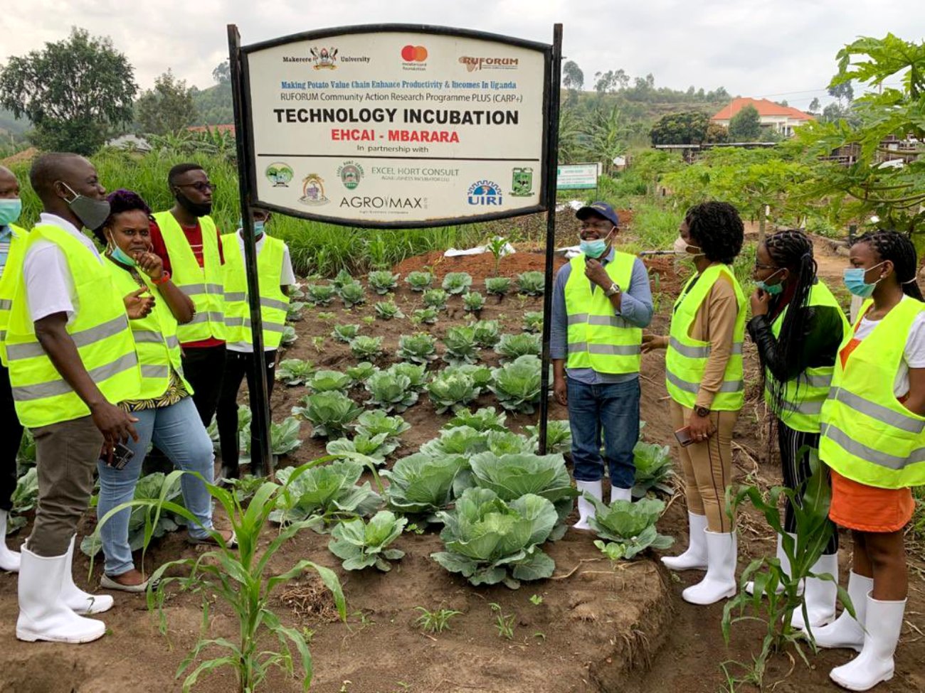 The Vice Chancellor, Prof. Barnabas Nawangwe (4th Right) and members of his family (Right of signpost) during his visit to EHCAI - Mbarara on 5th April 2021.