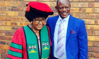 The Vice Chancellor, Prof. Barnabas Nawangwe (R) poses with Winnie Madikizela Mandela (L) shortly after robing her with the Makerere University PhD Gown and Cap at her home in Soweto, South Africa on 2nd February 2018.