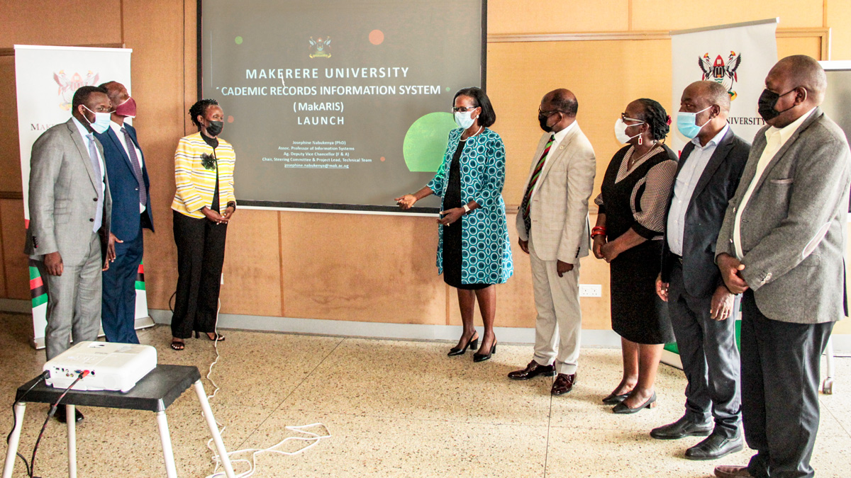 The Chairperson of Council, Mrs. Lorna Magara (5th R) flanked by Vice Chancellor, Prof. Barnabas Nawangwe (4th R) and Members of the MakARIS Steering Committee led by Ag. DVCFA-Assoc. Prof. Josephine Nabukenya (3rd L) at the launch on 6th May 2021, CTF1, Makerere University. L-R are: Mr. Yusuf Kiranda, Mr. Alfred Namoah Masikye, Assoc. Prof. Josephine Ahikire, Prof. Henry Alinaitwe and Mr. Silas Ngabirano.
