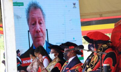 Dr. Seth Franklin Berkley (on screen) delivers his acceptance speech virtually shortly after being conferred upon the Honorary Doctor of Sciences (Honoris Causa) of Makerere University during Day 1 of the 71st Graduation Ceremony, 17th May 2021, Freedom Square as R-L: The Chancellor-Prof. Ezra Suruma, Vice Chancellor-Prof. Barnabas Nawangwe, Chairperson Council-Mrs. Lorna Magara, Mace Bearer-Ms. Nasike Sandra and Ms. Jolly Uzamukunda Karabaaya-MoES listen.