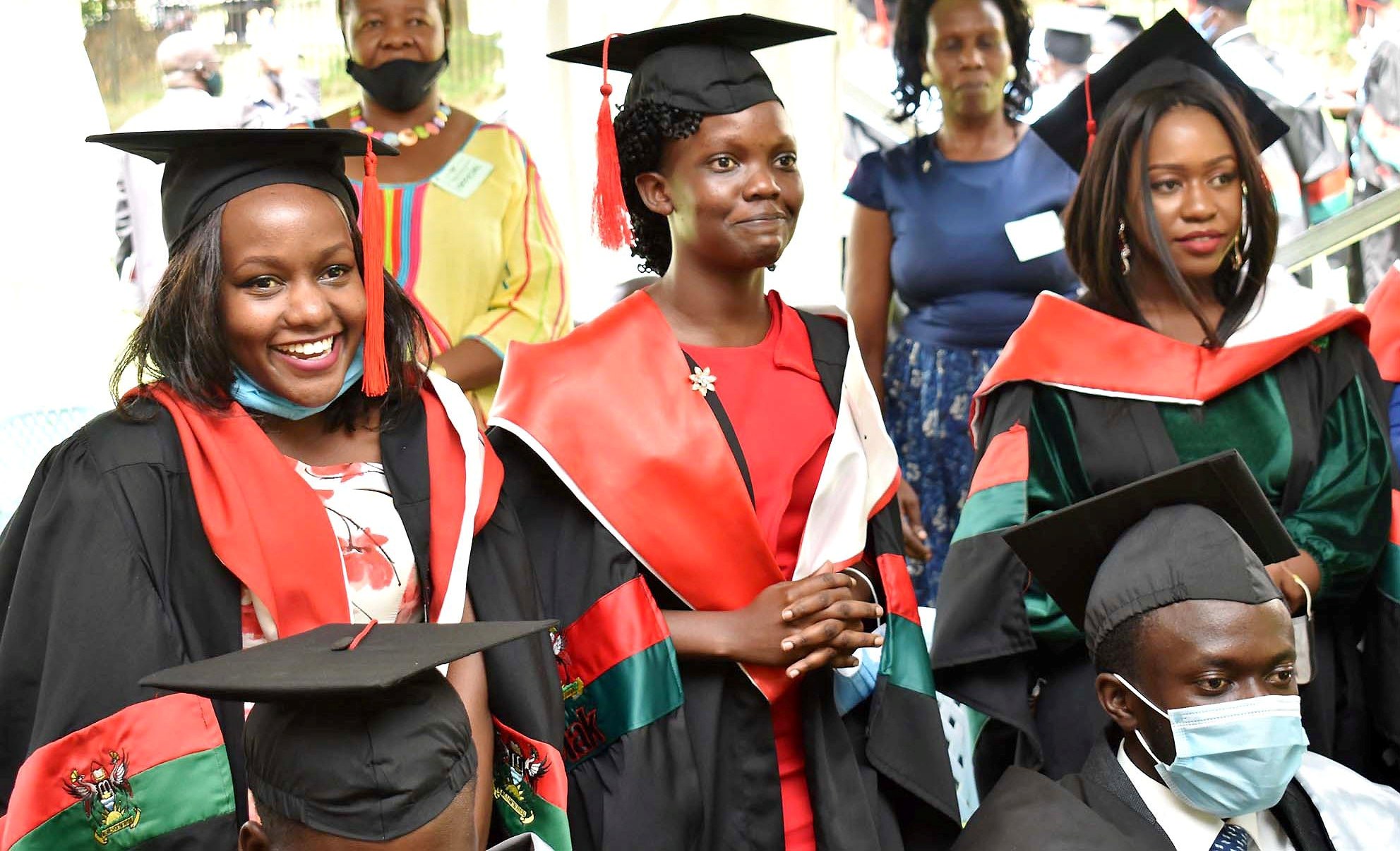 Female Graduands from the Margaret Trowell School of Industrial and Fine Arts (MTSIFA) bask in their moment of glory as their names are read out on Day 5 of the 71st Graduation Ceremony, 21st May 2021, Freedom Square, Makerere University.