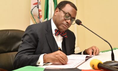 Dr. Akinwumi A. Adesina, President African Development Bank Group (AfDB) signs the Visitors' Book during the meeting with the Chairperson Council and Management on Day 5 of the 71st Graduation Ceremony, 21st May 2021, CTF1.
