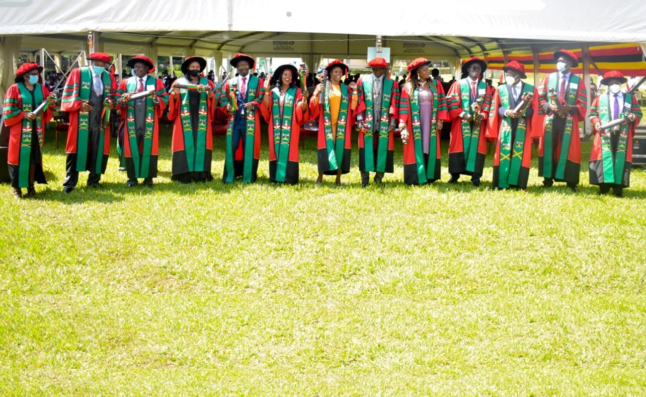 PhD Graduands of the First Session of the 71st Graduation Ceremony pose for a group photo on 17th May 2021, Freedom Square, Makerere University.