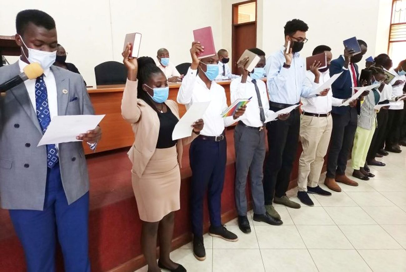 Incoming members of the Makerere Engineering Society (MES) Cabinet take oath during the Swearing-In ceremony for Student Associations' leaders on 21st May 2021, CEDAT Conference Hall, Makerere University.