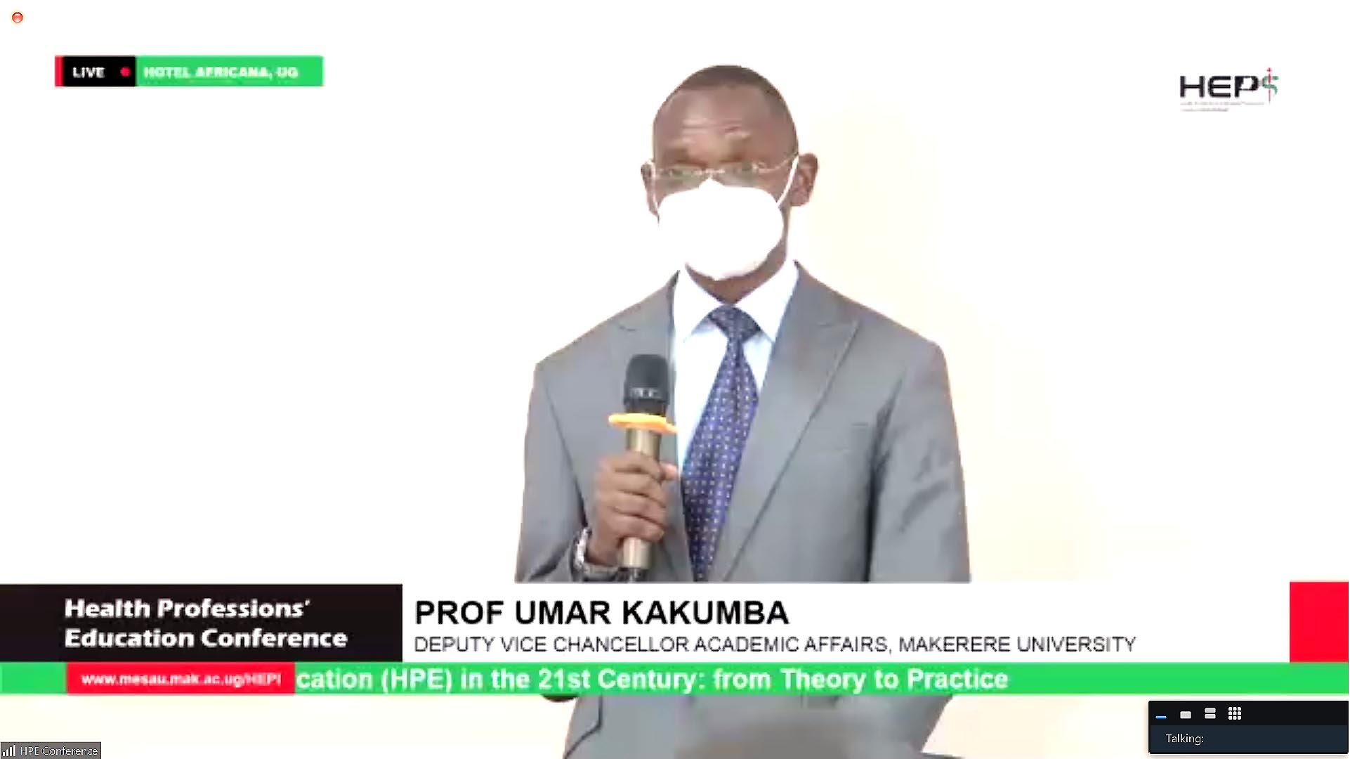 A Screenshot of the DVCAA, Dr. Umar Kakumba officially opening the Health Professions' Education Conference on 27th May 2021, Hotel Africana, Kampala Uganda.