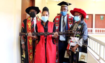 The Vice Chancellor, Prof. Barnabas Nawangwe (L) with the Academic Registrar, Mr. Alfred Masikye Namoah (2nd R), MUBS Registrar, Ms. Eldred Kyomuhangi-Manyindo (R) and the Mace Bearer (2nd L) on Day 4 of the 71st Graduation Ceremony, CTF1, Makerere University.