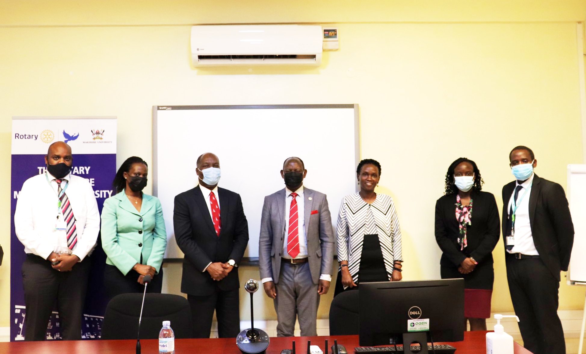 The Vice Chancellor, Prof. Barnabas Nawangwe (C) flanked by the DVCFA-Dr. Josephine Nabukenya (3rd R), MD-Albert Saltson (3rd L) and Standard Chartered Bank staff after the meeting on 4th May 2021, CTF1, Makerere University.