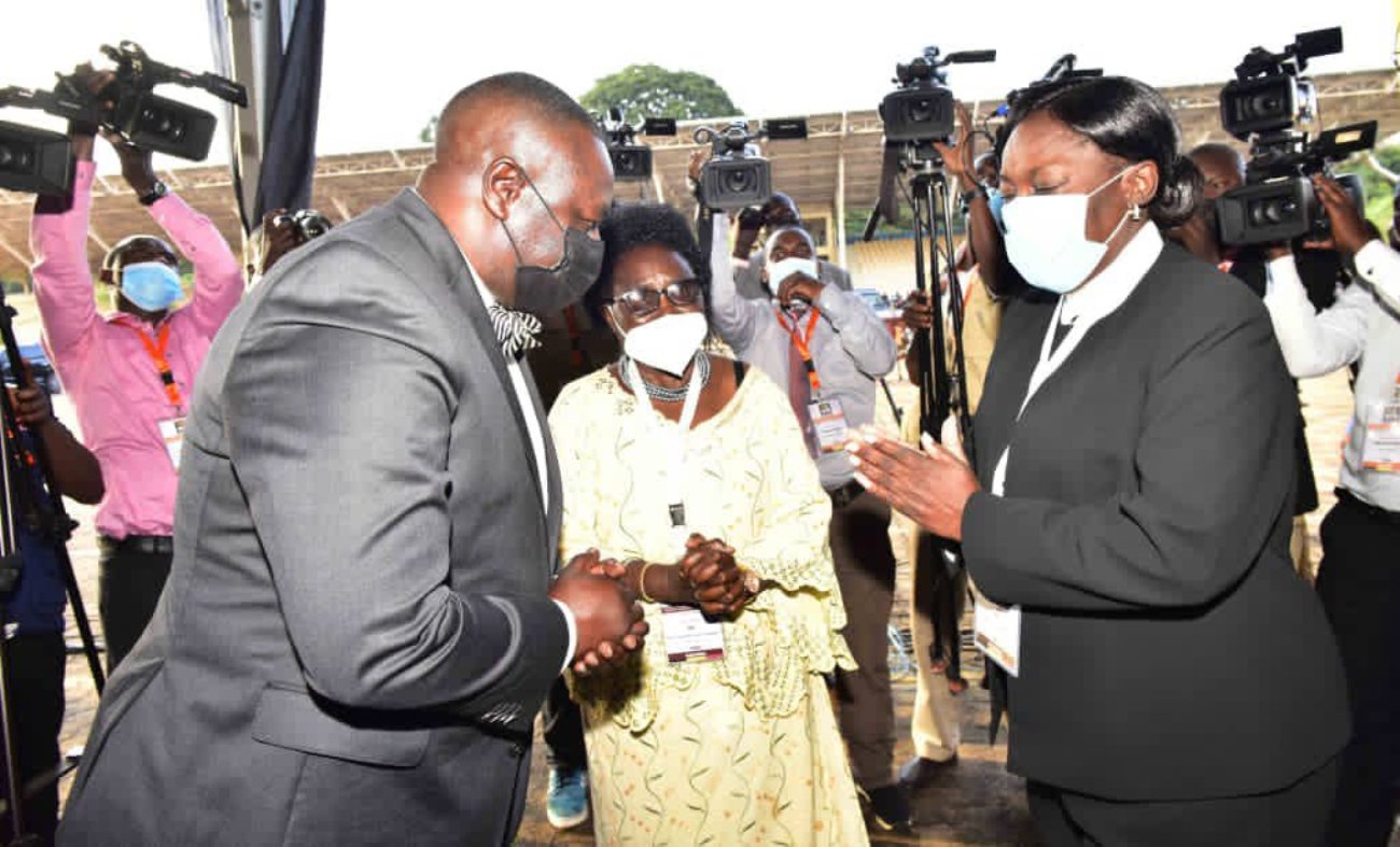 The Speaker Rt. Hon. Jacob Oulanyah (L) with outgoing speaker Rt. Hon. Rebecca Kadaga (R) during the first sitting of the 11th Parliament on 24th May 2021 held at the Kololo Independence Grounds. Photo credit: Twitter/Rt. Hon. @JacobOulanyah