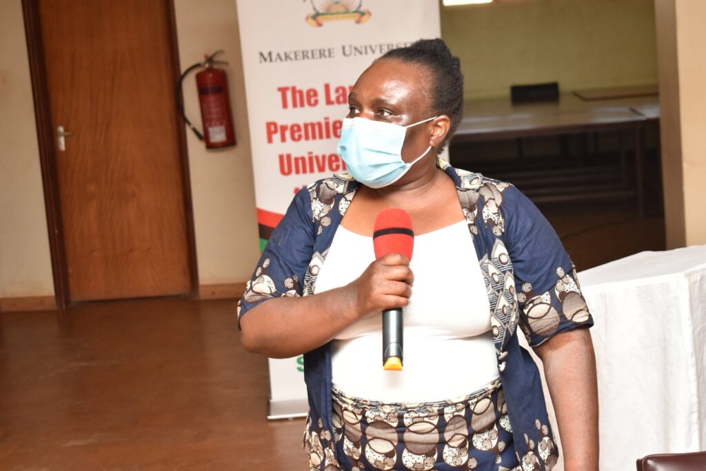 Ms. Rhodah Nalubega, PI of the Digitization of Land Archival Documents in Makerere University Library (1830-1995) Project speaks during the dissemination event held in the Main Library on 28th May 2021.