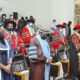R-L: The Vice Chancellor-Prof. Barnabas Nawangwe, Prof. William Bazeyo, and Dr. Sarah Ssali bow their heads during the Service to celebrate the life of Prof. Noble Banadda, 2nd July 2021, SFTNB Conference Hall, Makerere University.