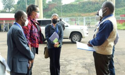 U.S. Ambassador to Uganda, H.E. Natalie E. Brown (2nd L) is received by Dr. Mwebesa Henry-Director General Health Services (L), Dr. Andrew Kambugu-IDI Executuve Director (R) and other officials from MoH, CDC and IDI upon arrival at Namboole COVID-19 Treatment Unit (CTU) on 9th July 2021. Photo credit: IDI