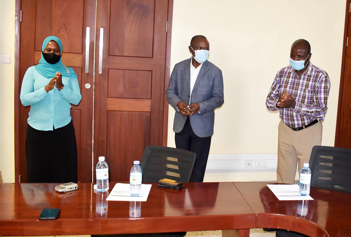 The Principal CoBAMS, Dr. Eria Hisali (C) with the EfD 2021 Grants Recipients Dr. Aisha Nanyiti (L) and Dr. Fred Matovu at the event on 18th August 2021, CTF2, Makerere University.