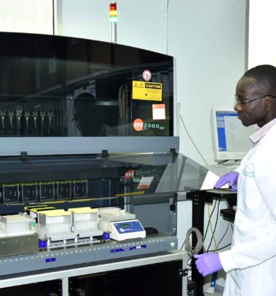 One of the staff uses the Abbott m2000 RealTime System in the Core Laboratory (CL), IDI, Makerere University, Kampala Uganda, East Africa.