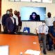 EfD-Mak Centre Director Prof. Edward Bbaale and research fellows pose for a group photograph with the facilitator Dr. Byela Tibesigwa on screen during the seminar on 7th September 2021, CTF2, Makerere University.
