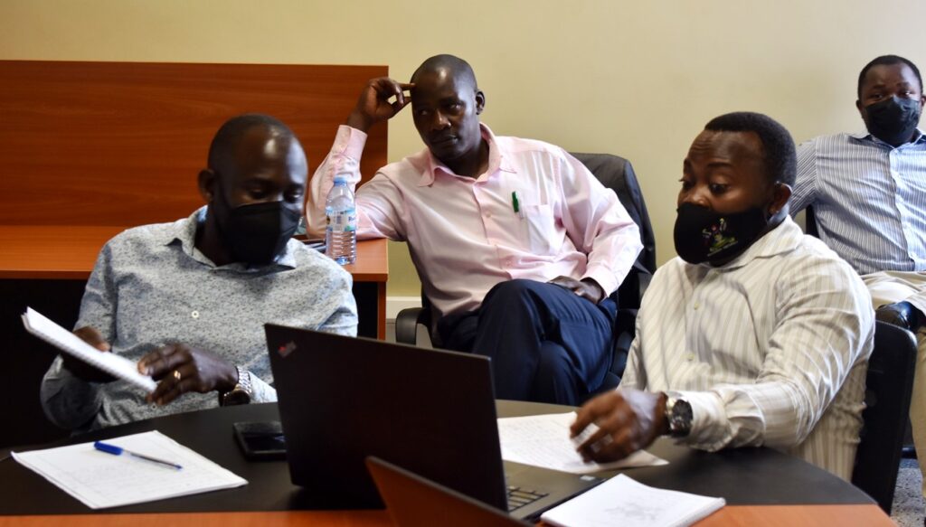 Some of the research fellows interact during the seminar.