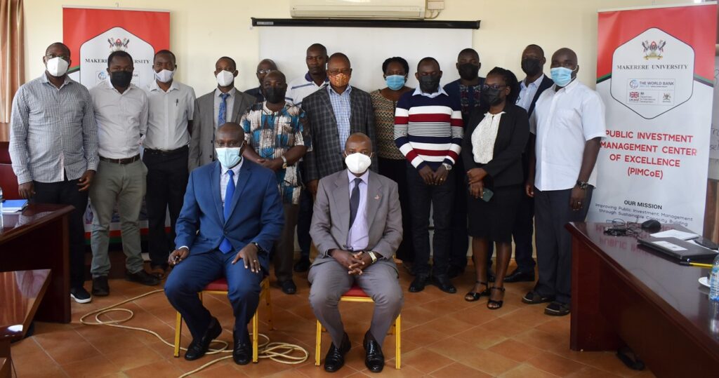 Seated L-R: Commissioner Ashaba Hannington and the PI Prof. Edward Bbaale pose for a group photograph with trainees and facilitators after the opening ceremony on 13th September 2021 at Essella Country Hotel in Wakiso District.