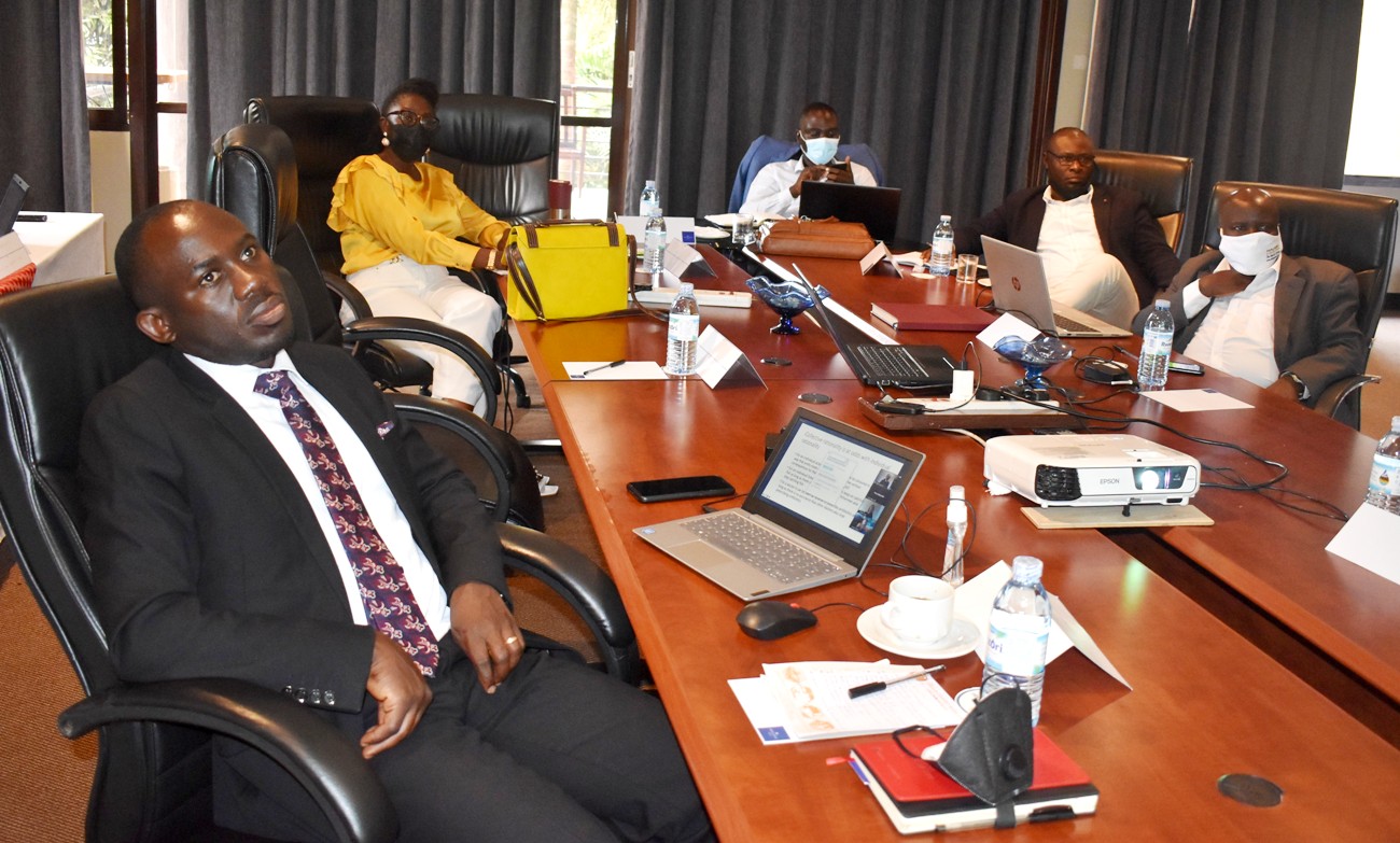 Mr. Peter Babyenda, Policy Engagement Specialist in charge of coordinating the IGE training program (L) with some of the physical participants on 16th September 2021, Protea Hotel, Kampala.