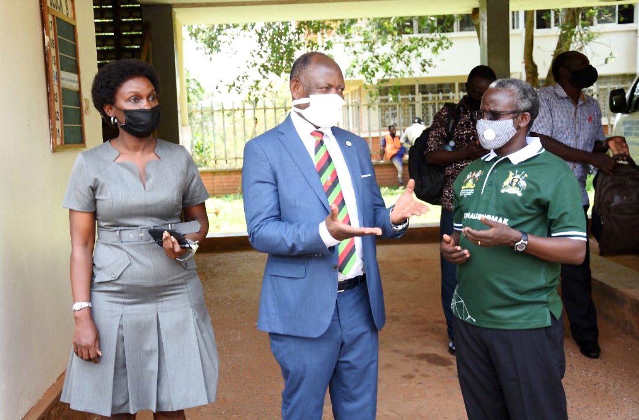 The Vice Chancellor-Prof. Barnabas Nawangwe (C) and Ag. DVCFA-Dr. Josephine Nabukenya (L) chat with the Project PI-Dr. William Tayeebwa (R) after inaugurating the Multimedia Production Hub at the Department of Journalism and Communication, Lincoln Flats, Makerere University.