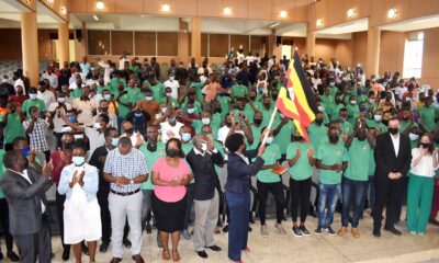 The Acting Vice Chancellor and DVCFA-Dr. Josephine Nabukenya (holding flag) flanked by Prof. Bernard Bashaasha (to her left), coordinators, students and CEO Agrostudies-Mr. Yaron Tamir (2nd R) and his Deputy during the flag of on 13th October 2021, CTF2 Auditorium, Makerere University.